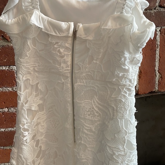 Lulu’s White Crochet Mini Dress with Ruffle Details - Picture 4 of 9